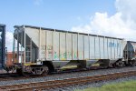 A DM&E Hopper trails on eastbound KCS Train 